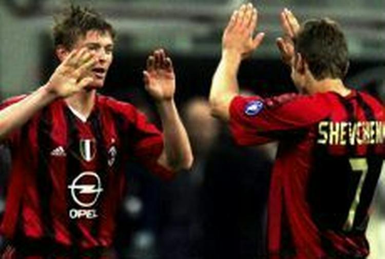 Tomasson og Sjentjenko i Milans angreb kan snart høre fortiden til. - Arkivfoto: AP. 