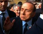 Den italienske regeringsleder, Silvio Berlusconi, finder det helt urimeligt, som han dæmoniseres af sine politiske modstandere. - Foto: AP/Gino Perotto 