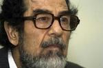 Saddam Hussein blev ifølge hans advokater angrebet af en dommer til et retsmøde i torsdags. - Foto: AP 