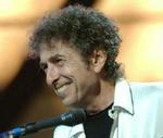 En smilende Dylan under en koncert i New York 2003. - Arkivfoto: AP 