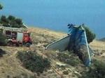 Vragresterne fra flyet landede flere hundrede meter fra hinanden i de græske bjerge. - Foto: AP 
