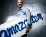 En af grundlæggerne af net-boghandlen Amazon.com Jeff Bezos. Nu sælger boghandlen også enkelte kapitler og sider fra bøger - Foto: AP 
