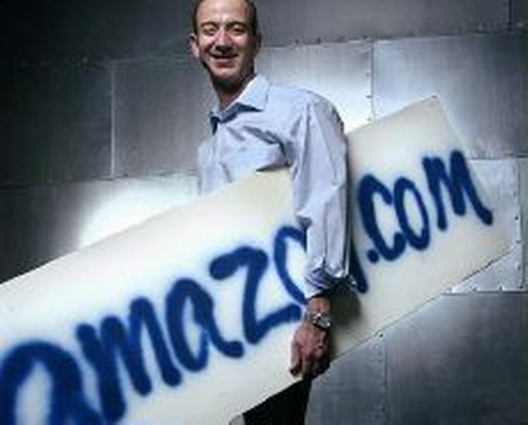 En af grundlæggerne af net-boghandlen Amazon.com Jeff Bezos. Nu sælger boghandlen også enkelte kapitler og sider fra bøger - Foto: AP 
