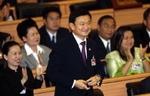 Thailands premierminister Thaksin Shinawatra opfordrer en penisopereret minister til at stå frem, så regeringens omdømme ikke lider yderligere skade. - Foto: AP 