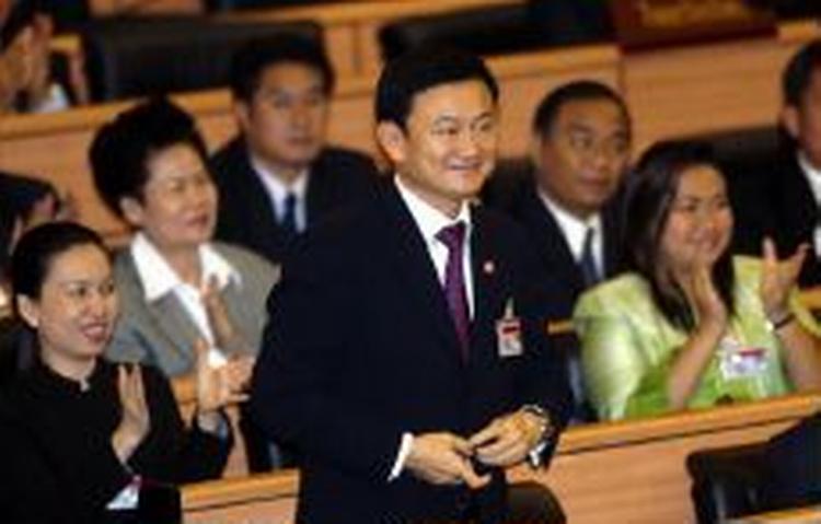 Thailands premierminister Thaksin Shinawatra opfordrer en penisopereret minister til at stå frem, så regeringens omdømme ikke lider yderligere skade. - Foto: AP 