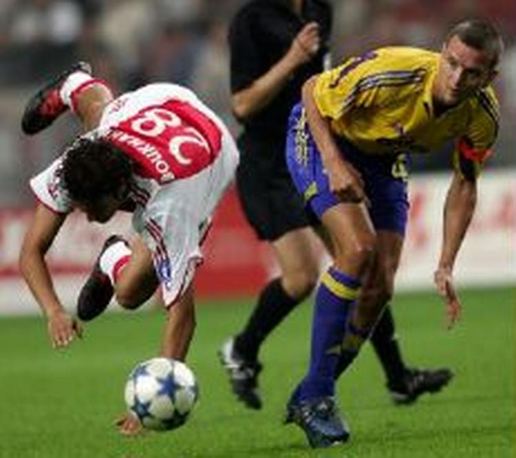 Brøndbys anfører Per Nielsen kæmpede hårdt i kampen mod Ajax. Men anføreren er tilfreds med at skulle spille UEFA-Cup. - Foto: AP 