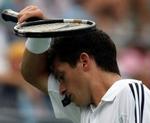 Tim Henman er ude af US Open. - Foto: AP 