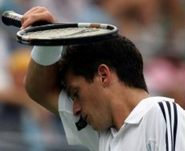 Tim Henman er ude af US Open. - Foto: AP 
