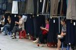 Kinesiske tøjsælgere i Anhui-provinsen. - Foto: AP 