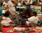 Kæmpehallen Astrodome i Houston er allerede stopfyldt med flygtninge. - Foto: AP 
