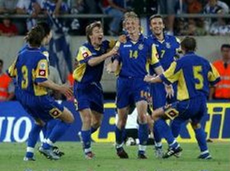 Ukraine-spillerne jubler efter en scoring mod Grækenland. - Arkivfoto: AP. 