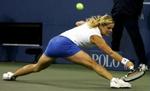 'Jeg spillede ikke så godt, men jeg kæmpede', sagde Kim Clijsters efter sejren over Venus Williams. - Foto: AP 