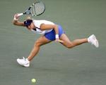 Belgiske Kim Clijsters vandt i semifinalen i US Open over topseedede Maria Sharapova fra Rusland. - Foto: AP 
