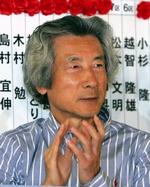 Regeringslederen Junichiro Koizumi vandt det japanske valg med en stor margen. Han har nu vundet opbakning til et omfattende reformprogram. - Foto: AP 