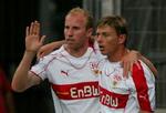 Ludovic Magnin lykønsker Tomasson med målet. - Foto: AP 