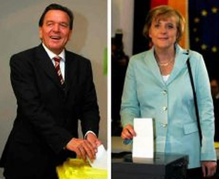 Både Angela Merkel og Gerhard Schröder vil danne regering. - Foto: AP 