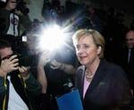 Merkel ankommer til pressekonferencen i Berlin i dag. - Foto: AP 