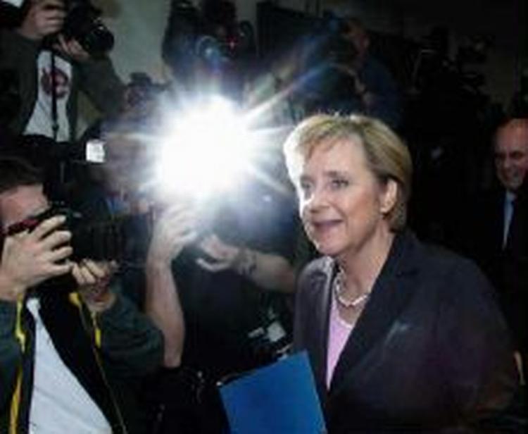 Merkel ankommer til pressekonferencen i Berlin i dag. - Foto: AP 