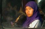 Kvinderne i Aceh-provinsen lever med strenge påbud om at bære hovedbeklædning. - Arkivfoto: AP 