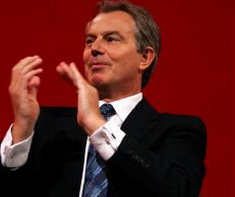 Premierminister Blair bifalder afvæbningen af IRA. Her ses han på et foto fra en Labour-konference. - Foto: AP 
