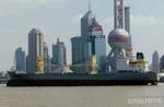 Væksten i Kinas økonomi afspejles i storbyer som Shanghai, men også i den kraftigt øgede korruption i landet. Det viser en rapport fra OECD. - Foto: Finn Frandsen 