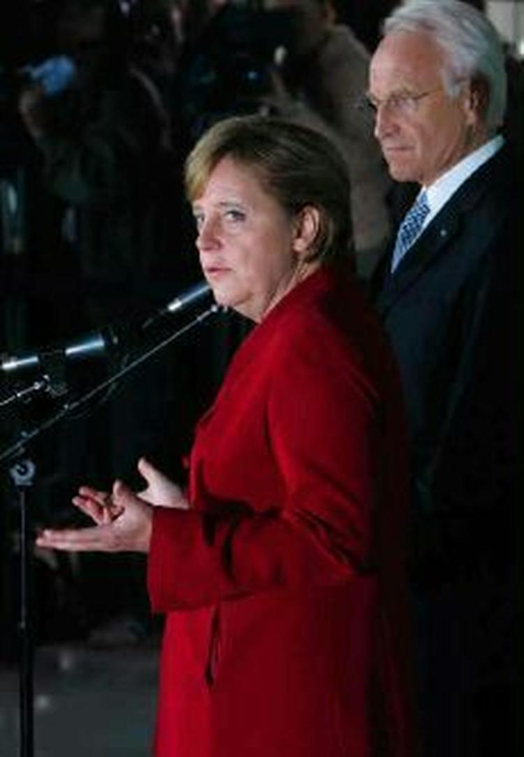 Angela Merkel briefer pressen efter mødet i dag. - Foto: AP 