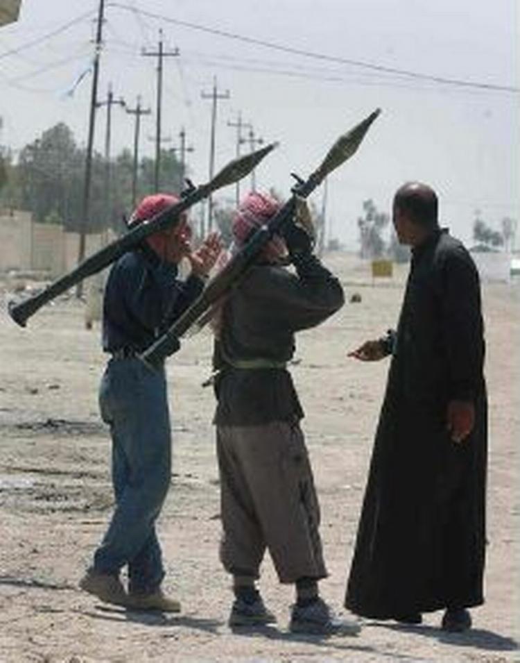 Sunnimuslimske oprørere i byen Fallujah. - Arkivfoto: AP 