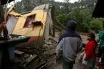 Indbyggerne i den lille landsby Chimaltenango i Guatemala har mærket eftervirkningerne af orkan Stan. - Foto: AP 