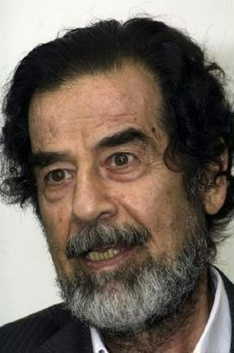 En undersøgelsesdommer får lov at udspørge herboende irakere i sagen mod Saddam Hussein. - Arkivfoto: AP 