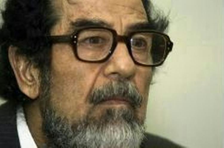 Saddam Hussein kan få udskudt sin rettergang blot et par dage efter den er begyndt - Foto: AP 
