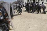 En dansker af arabisk afstamning deltager i oprøret i Irak - Foto: AP 