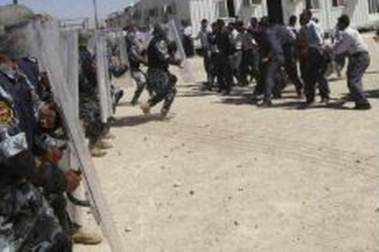 En dansker af arabisk afstamning deltager i oprøret i Irak - Foto: AP 