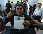 En ældre kurdisk herre afgiver in stemme i byen Kirkuk. - Foto: AP 