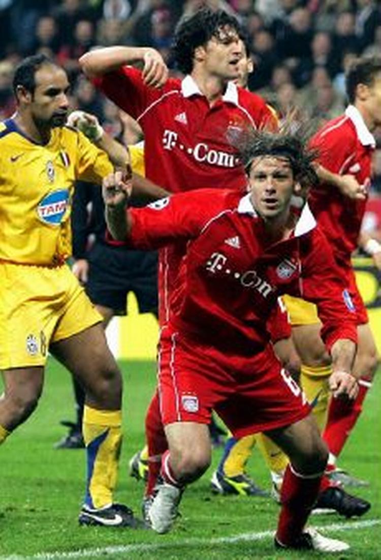 Bayerns Martin Demichelis jubler efter at have scoret sydtyskernes andet mål i 2-1-sejren over Juventus. - Foto: AP 