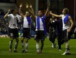 Artmedia-spillerne fejrede det ene point på Ibrox. - Foto: AP. 