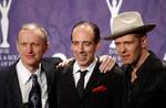 Terry Chimes, Mick Jones og Paul Simonon har sagt ja til at en stribe sange fra The Clash er med på lydsporet til filmen 'Bang Bang Orangutang'. - Foto: AP 