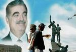 Den dræbte libanesiske premierminister Rafiq Hariri er stadig afbildet på Beiruts centrale torv. Nu skal FN's Sikkerhedsråd tage sig af de syriske mistænkte for mordet, mener Frankrig og USA. - Arkivfoto: AP 