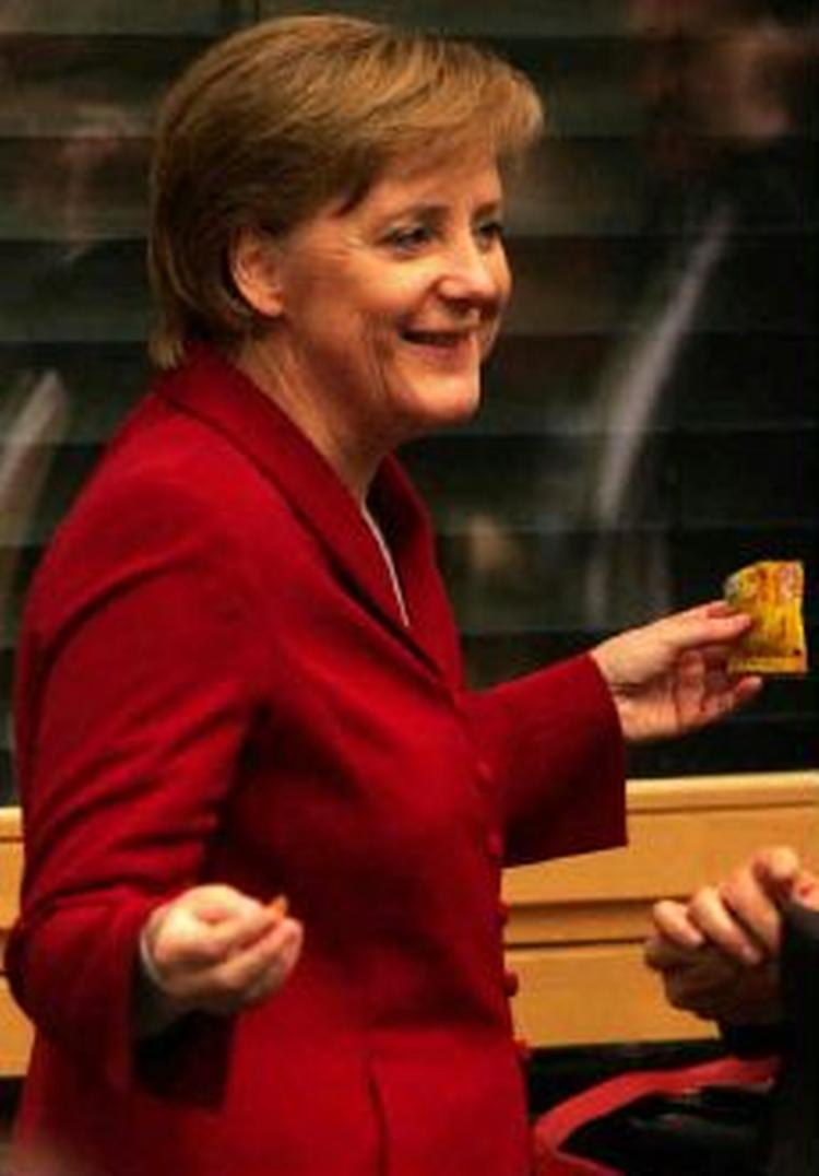 Den kommende tyske forbundskansler, Angela Merkel, har endelig fået sammensat sin regering - Foto: AP 