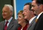 Både Angela Merkel og hendes kommende vicekansler og arbejdsminister, SPD-formanden Franz Müntefering, er glade for den nye regeringsaftale - Foto: AP 