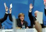 Angela Merkel stemmer ja til regeringen på CDU s såkaldte lille landsmøde i Berlin. - Foto: AP 