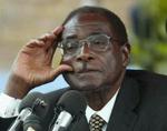 To danske kunstnere har formået at trænge gennem Zimbabwes strenge mediecensur og lave grin med præsident Robert Mugabe. - Arkivfoto: AP 