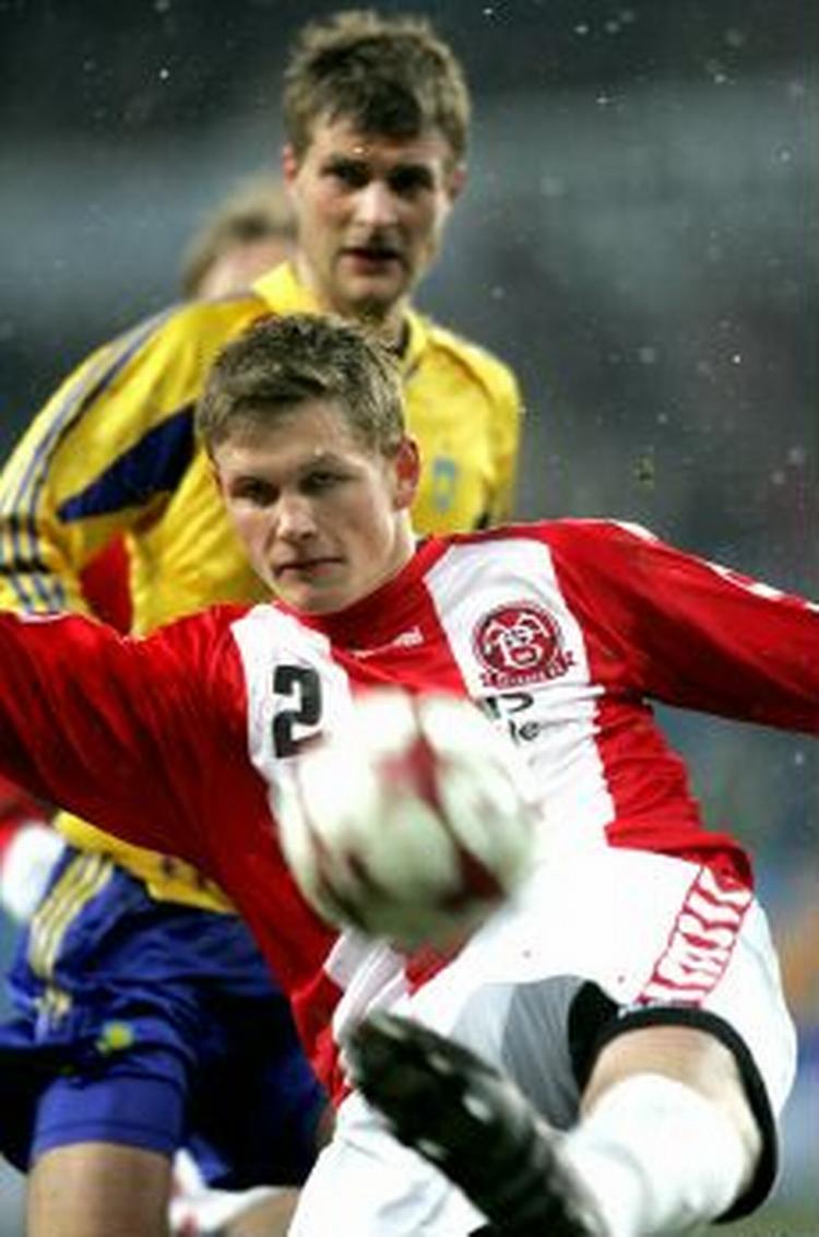 Michael Jacobsen ender en dag på landsholdet, spår man i AaB. - Arkivfoto: Lars Poulsen 
