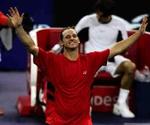 David Nalbandian gjorde det umulige og slog top-favoritten Federer i finalen ved Masters Cup - Foto: AP 