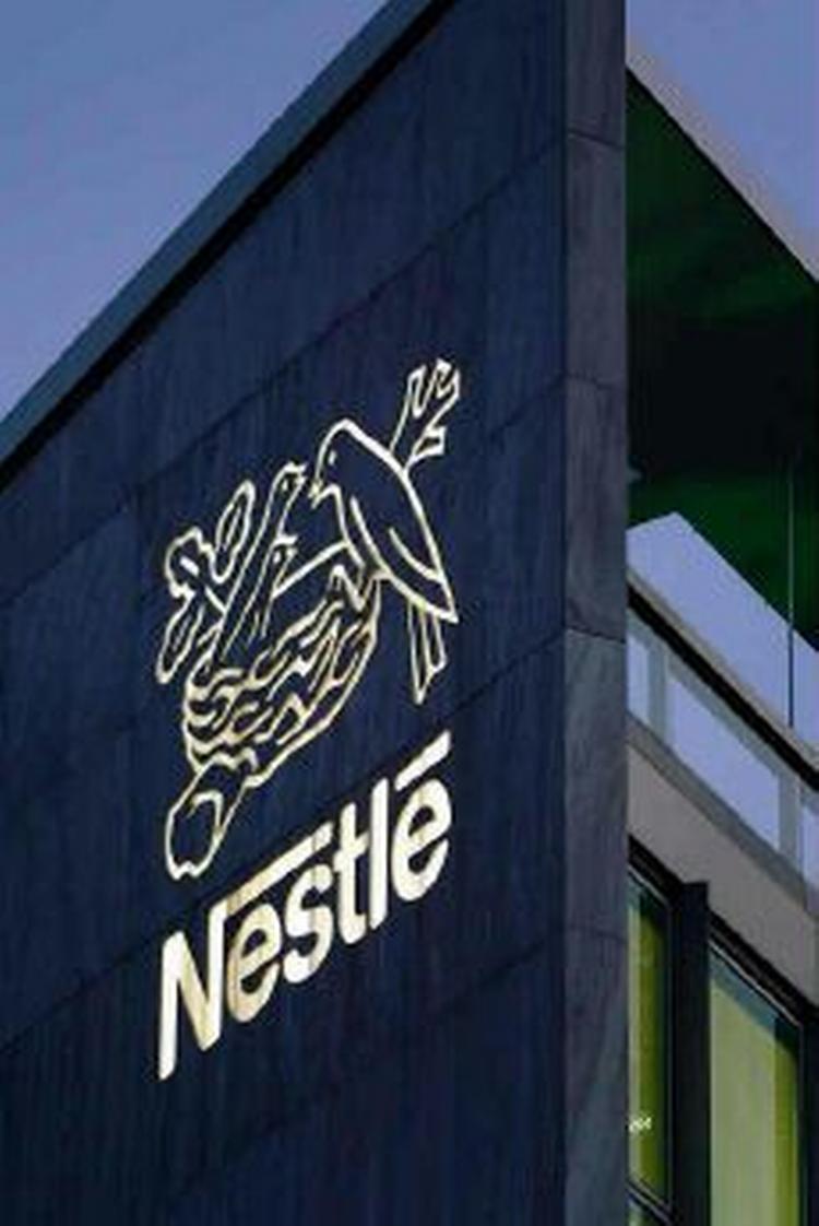 Den schweiziske fødevaregigant Nestle er kommet i modvind efter konfiskationer af forurenet babymælk i Italien. - Arkivfoto: AP 