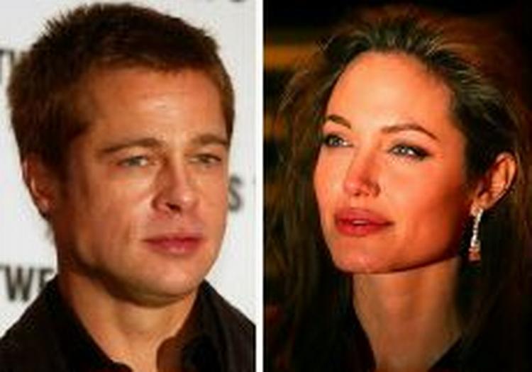 Der har længe været spekuleret heftigt i om Angelina Jolie og Brad Pitt danner par.- Foto: AP 