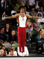 Hiroyuki Tomita var helt suveræn under sin øvelse i ringene, og guldet til Japan fik følgeskab af sølv.   Foto: Rick Rycroft/AP 