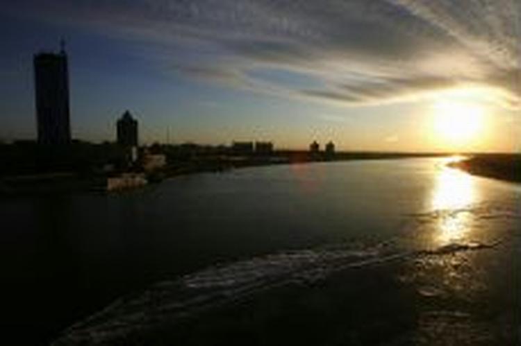 Solopgang ved byen Harbin. - Foto: AP 