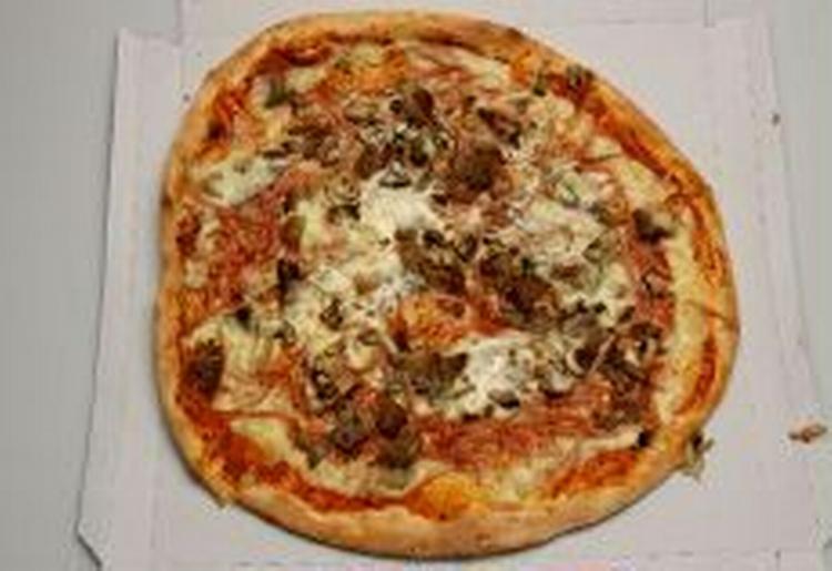Flere ton gammelt kød er endt i danske maver - blandt andet via bacon på pizzaen - men nu er der styr på skandalen, mener Fødevarestyrelsen. - Arkivfoto: Finn Frandsen 