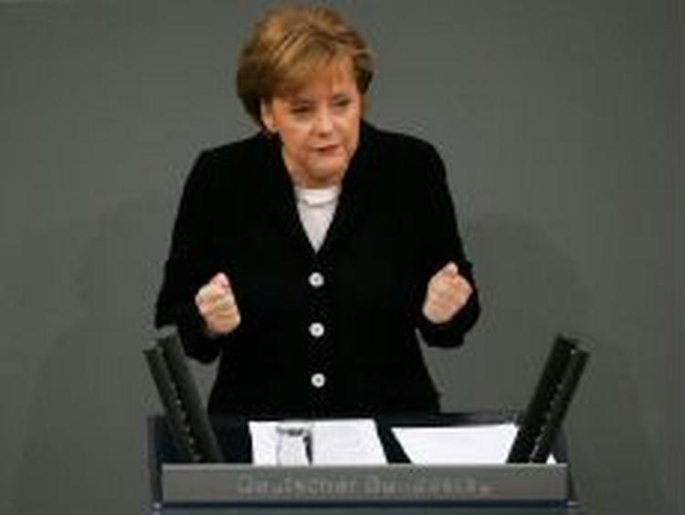 »I kampen mod international terrorisme må vi ikke give efter«, siger kansler Merkel. - Foto: AP 