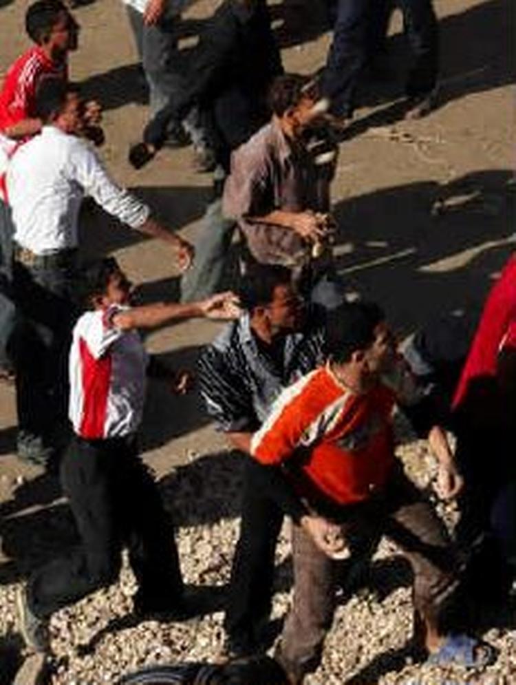 Egyptisk politi skød og dræbte en tilhænger af en oppositionspolitiker i Baltim nord for Kairo - Foto: AP 
